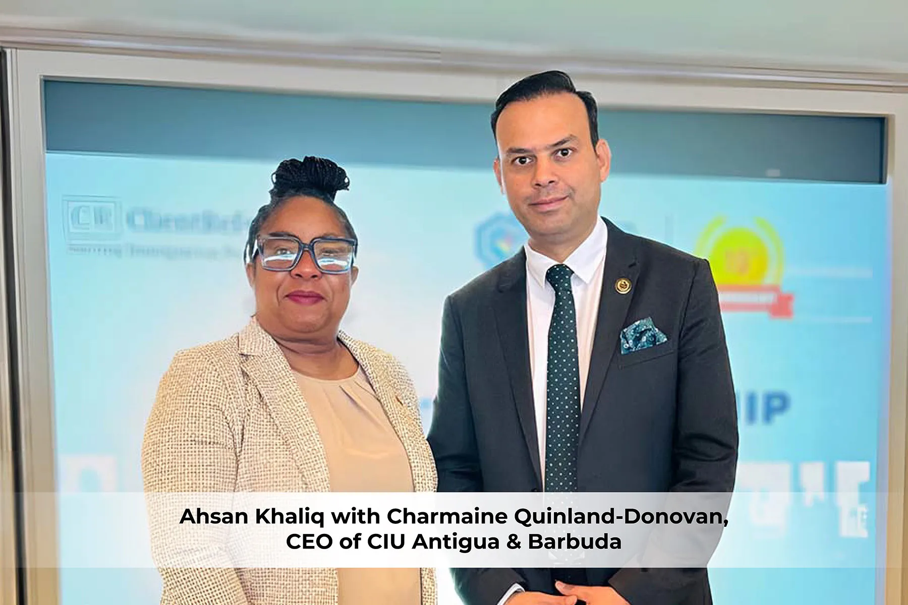 Ahsan Khaliq with Charmaine Quinland-Donovan, CEO of CIU Antigua & Barbuda