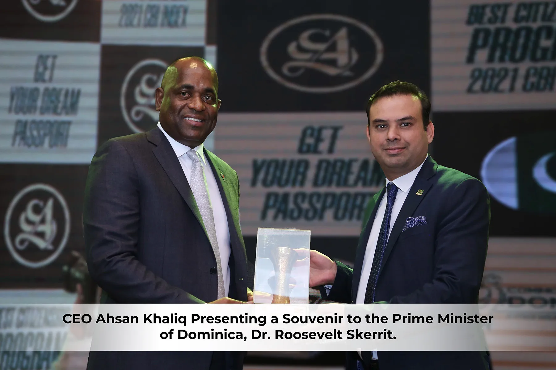 CEO Ahsan Khaliq presenting a souvenir to the Prime Minister of Dominica, Dr. Roosevelt Skerrit